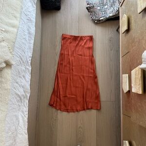 Orange satin midi skirt